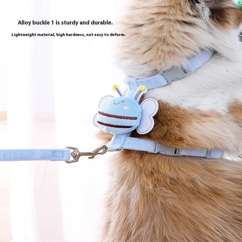 Pink teddy bee-shaped adjustable cat leash and rope on a blue background.