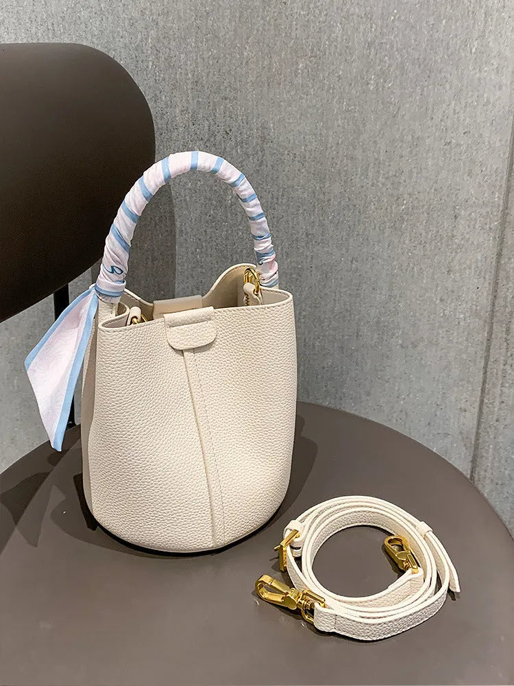 Simple fashion PU handbag for women with bow detail in milky white colour