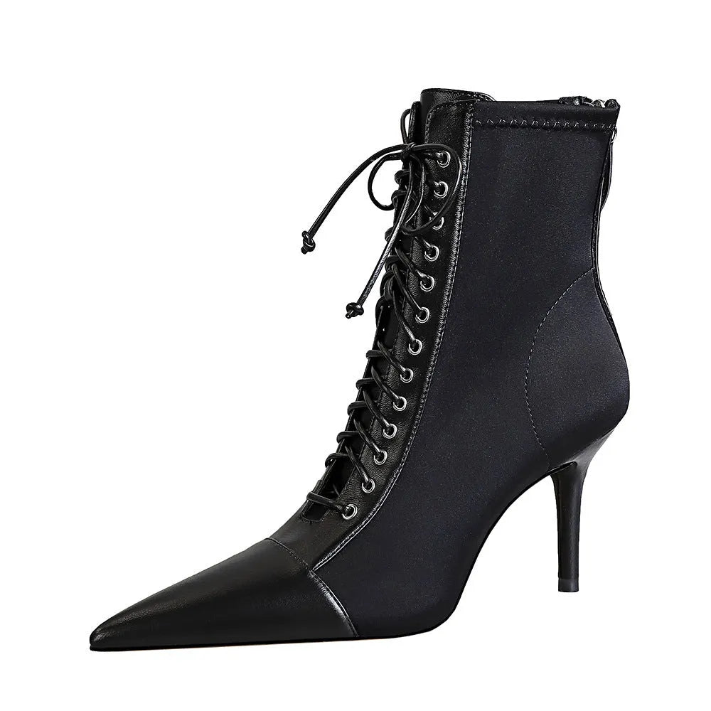 Black women's stiletto heel boots with pointed toe, back zipper, and 6-8CM heel, solid colour