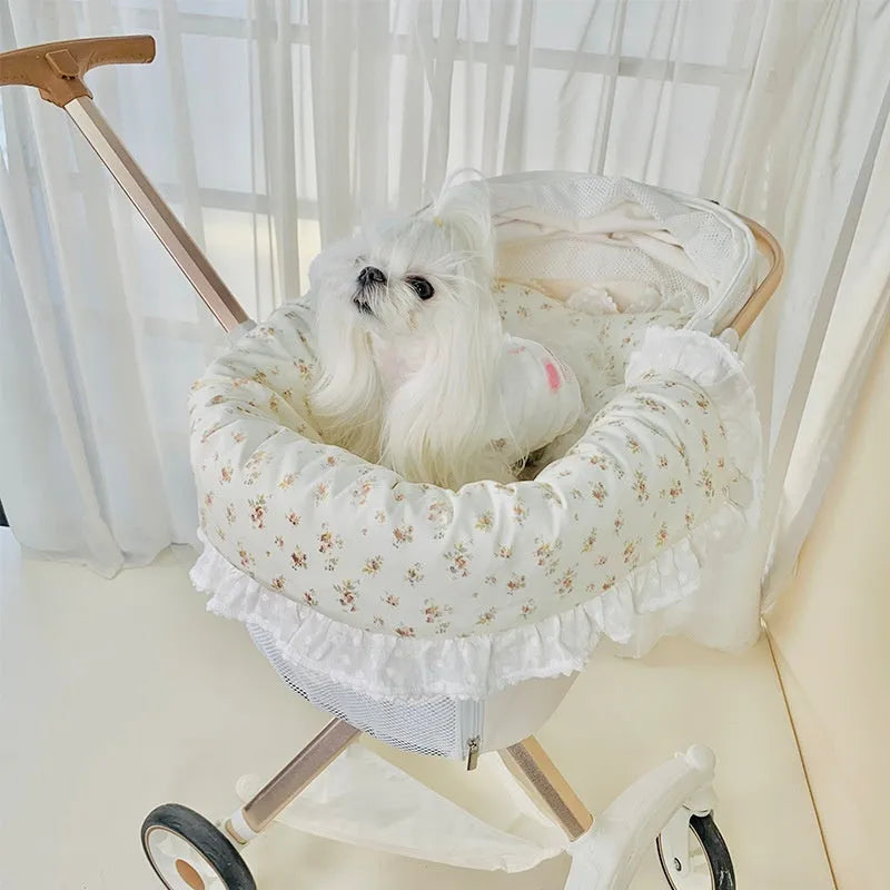 Removable washable pet stroller pad set showing towel, cushion, and pillow in a floral pattern.