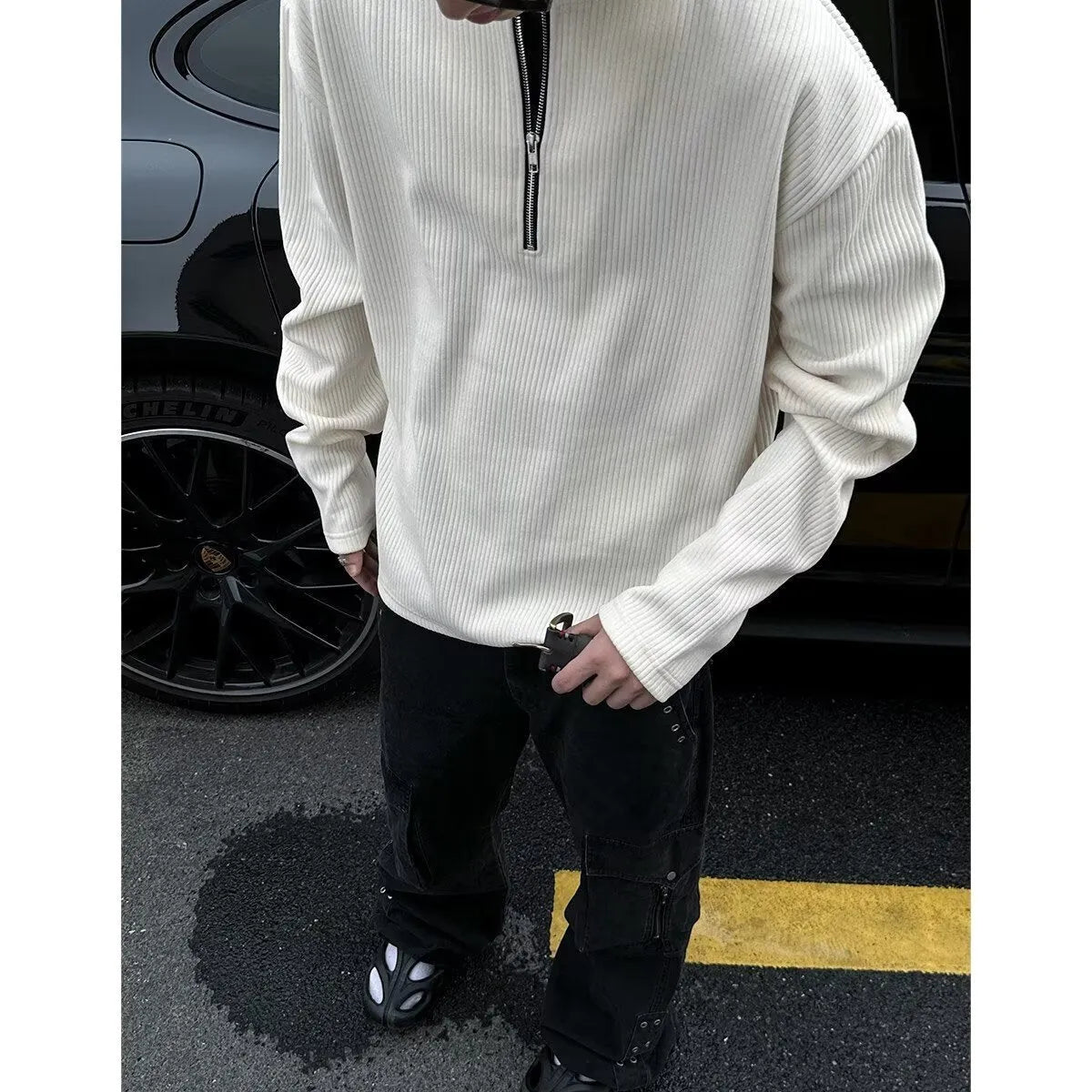 Solid colour loose fit long sleeve pullover top in grey, black, or apricot.