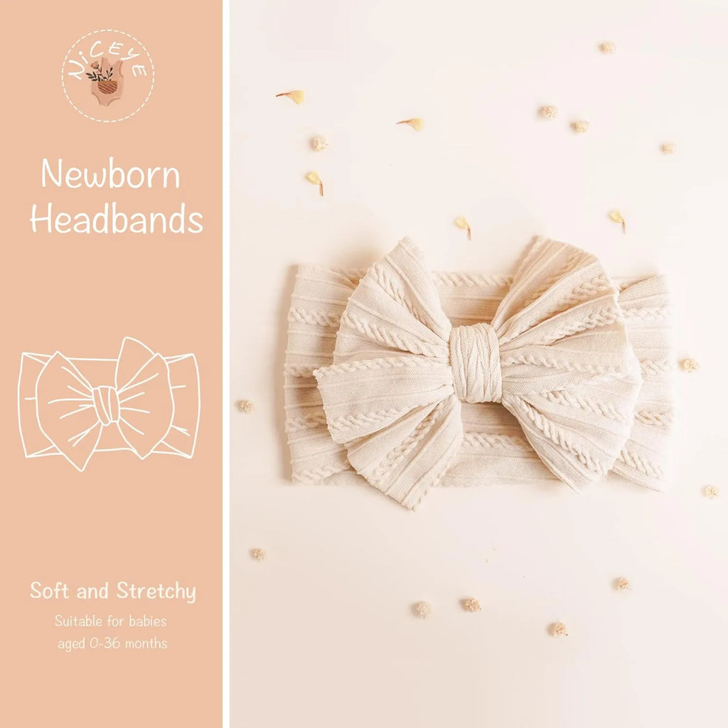 Handmade stretchy nylon baby headband with bow on newborn girl