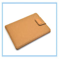 Vertical clamshell laptop bag in grey with plush felt interior and waterproof polyester exterior