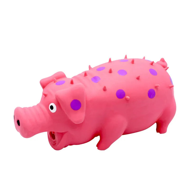 Blue latex pig-shaped dog chew toy with textured surface and squeaker on a wooden floor.