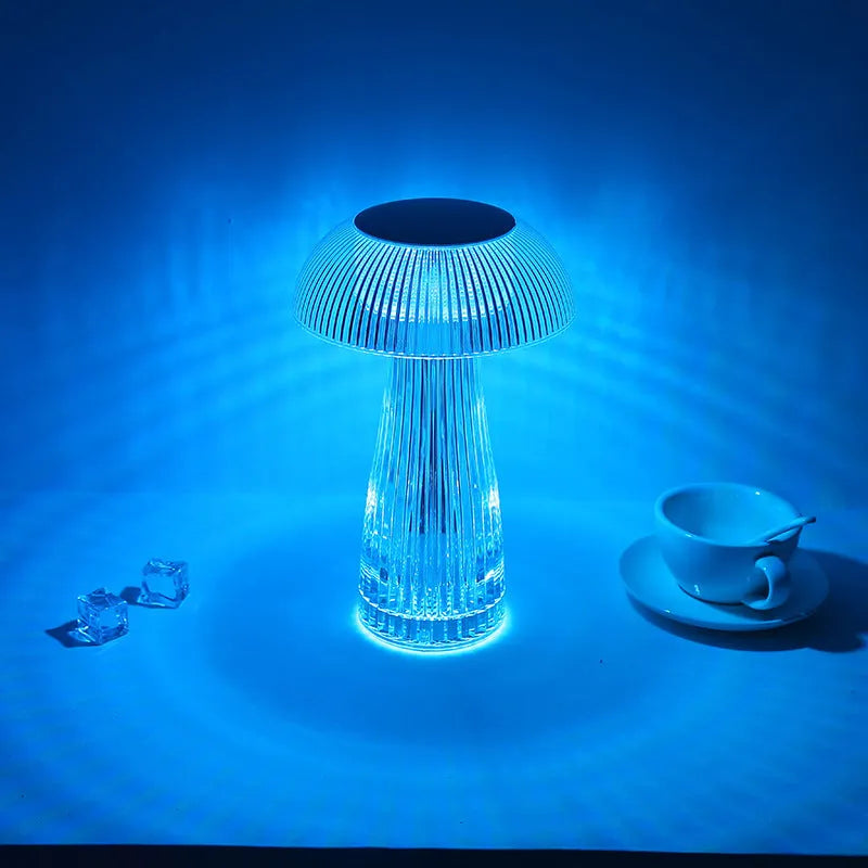 Creative crystal acrylic jellyfish table lamp with touch control and colour options on a desk