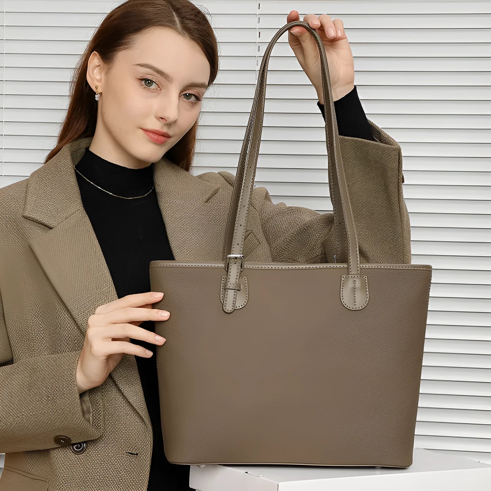 Genuine leather women's tote bag in horizontal square shape showing internal organisers and sandwich pocket