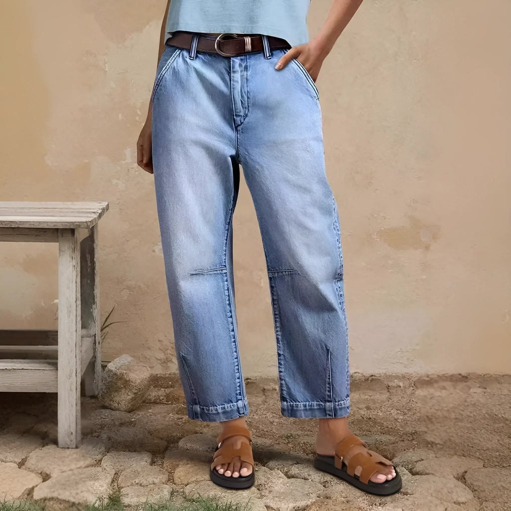 Casual loose jeans trousers in light blue denim with washed finish