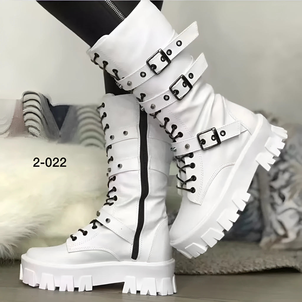 A pair of black women's mid-calf boots with a side zip and a round toe, showing the metal buckle detail.