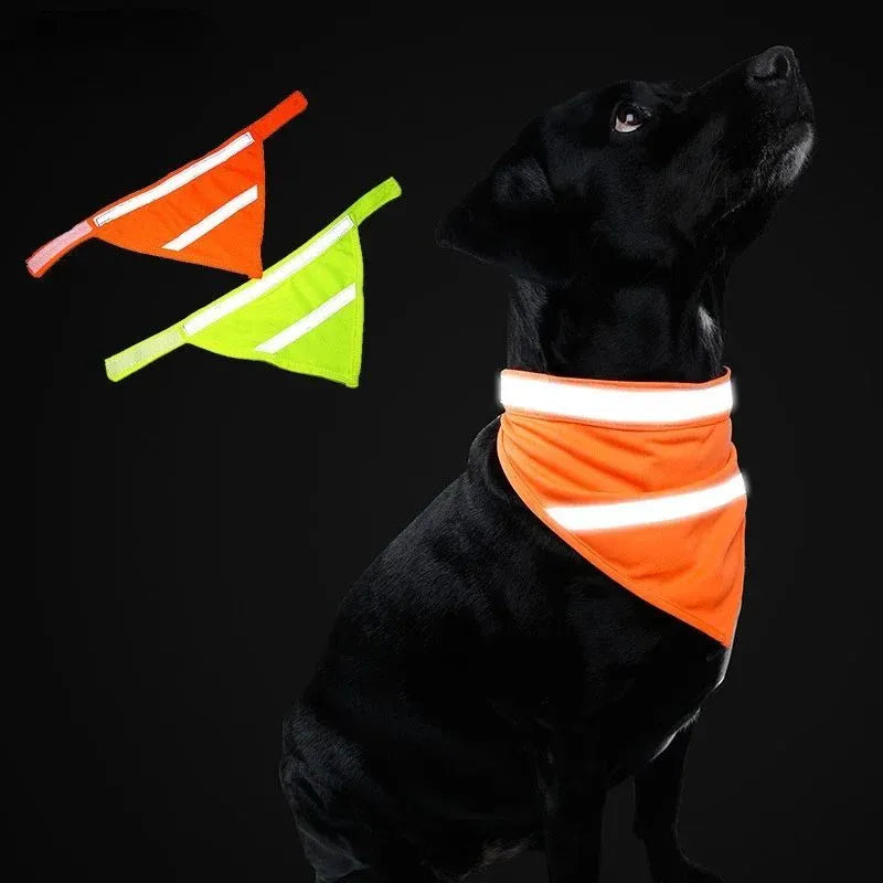 Yellow orange reflective dog bandana with adhesive strap shown on pet collar