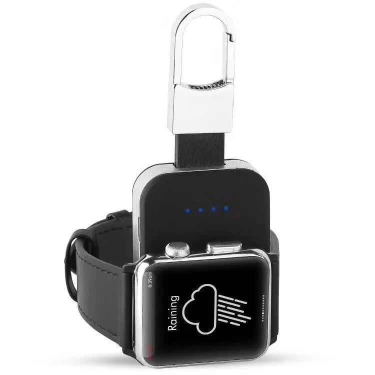 Black Apple Watch wireless keychain power bank showing compact size and charging surface.