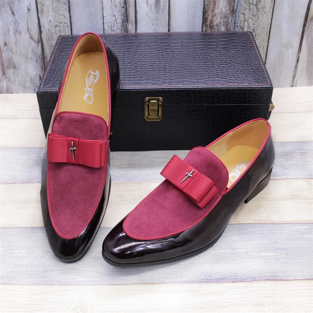 Men's glossy black patent leather low-top shoes with a tassel on a leather toe holder.
