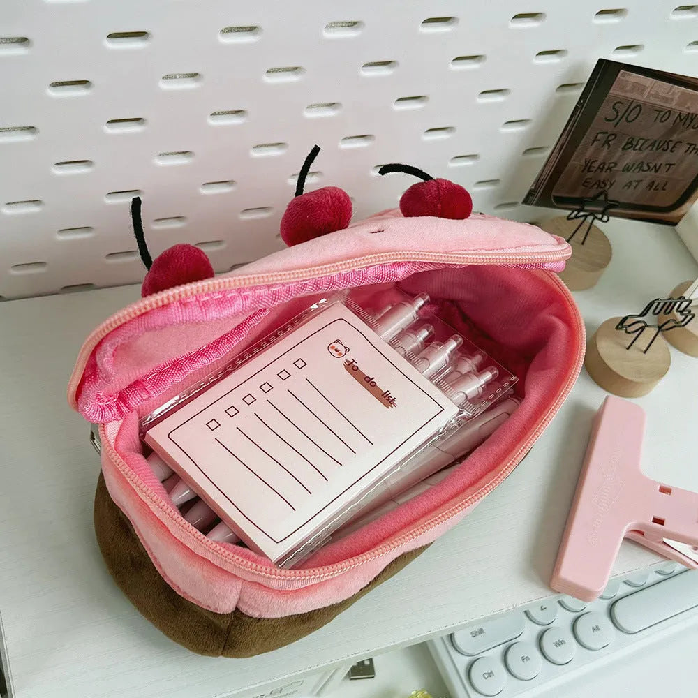 A Cherry Cake themed plush pencil bag made from soft velvet fabric.