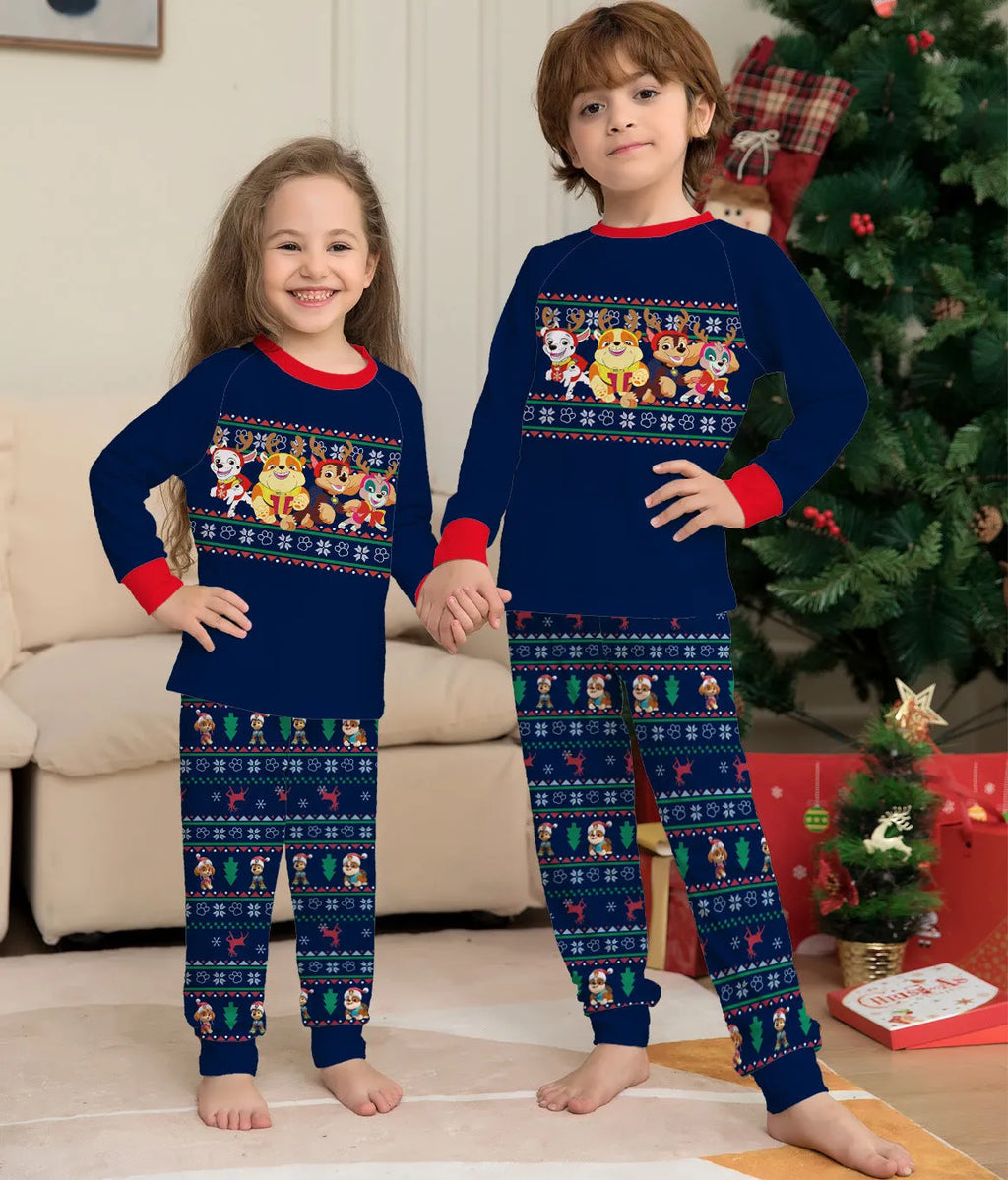 Matching red plaid Christmas pyjamas with cartoon deer print for men, women, kids, and dogs on a mannequin.