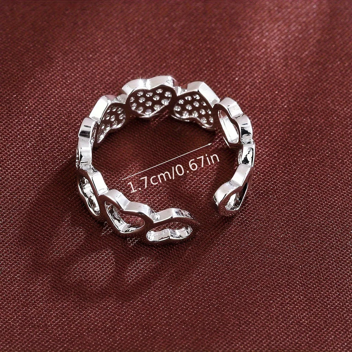Adjustable geometric copper couple's ring with love heart design in gold or silver colour.