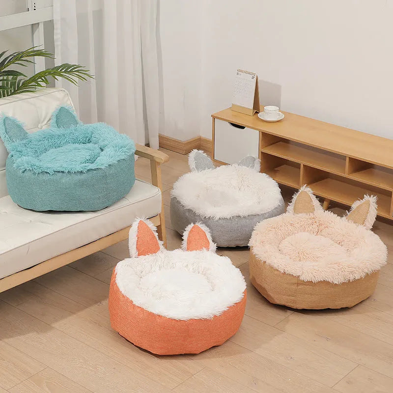 Plush faux fur circular pet bed for cats and small dogs in blue colour showing soft textured material