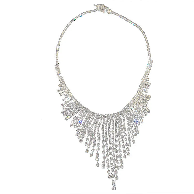 Silver alloy diamond tassel necklace with geometric pendant and ball bead chain on a white background