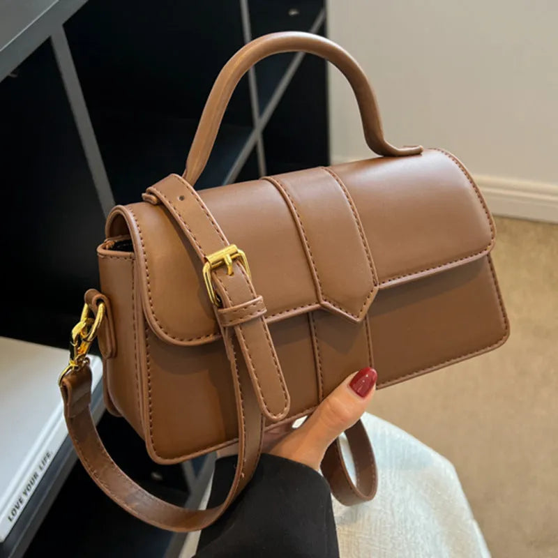Women's beige PU messenger bag with file organiser, showing horizontal square shape and external pocket