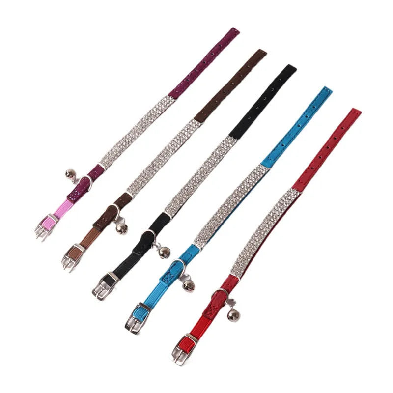 Soft flocking cat collar with elastic buckle and metal gang drill in assorted colours.