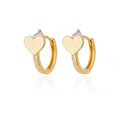 A pair of gold tone heart-shaped stud earrings for women with a simple zircon love design.