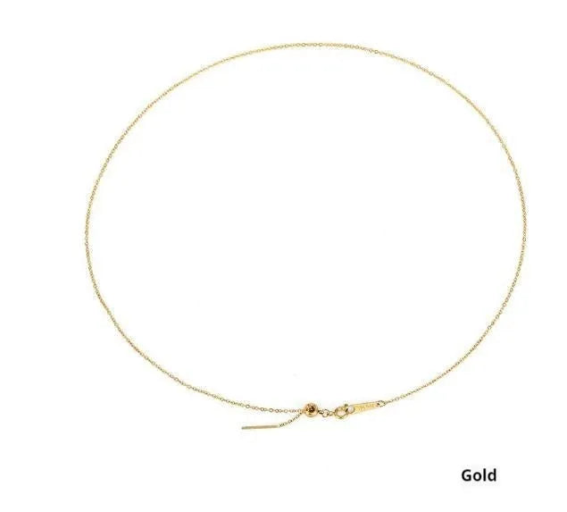 Stainless steel necklace with a U-shaped pendant on a chain, shown in steel, gold, and rose gold colour options.