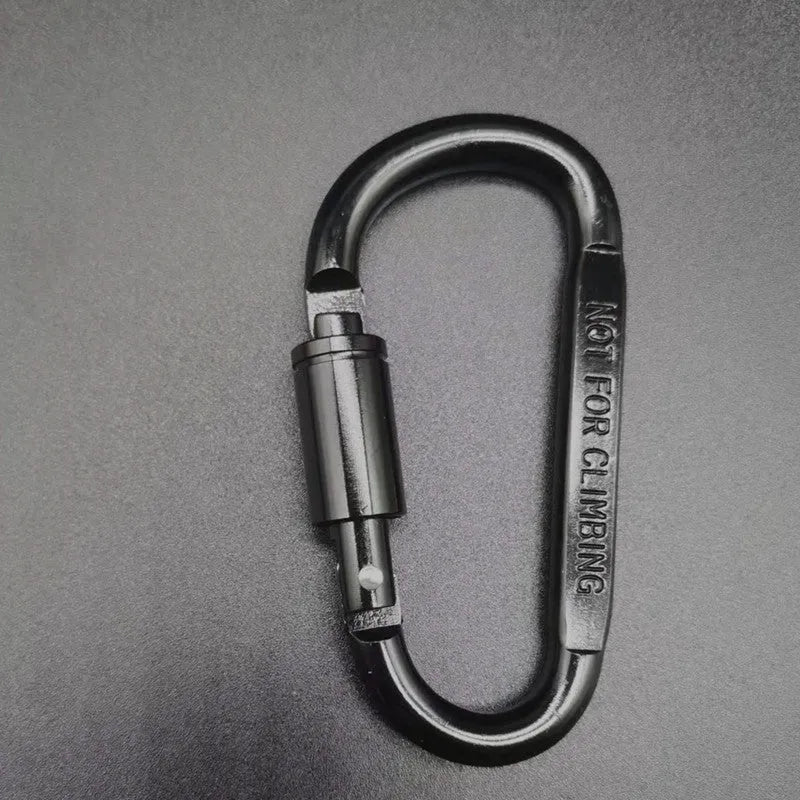 D-type aluminium locking carabiner in a selection of ten colours on a grey background.