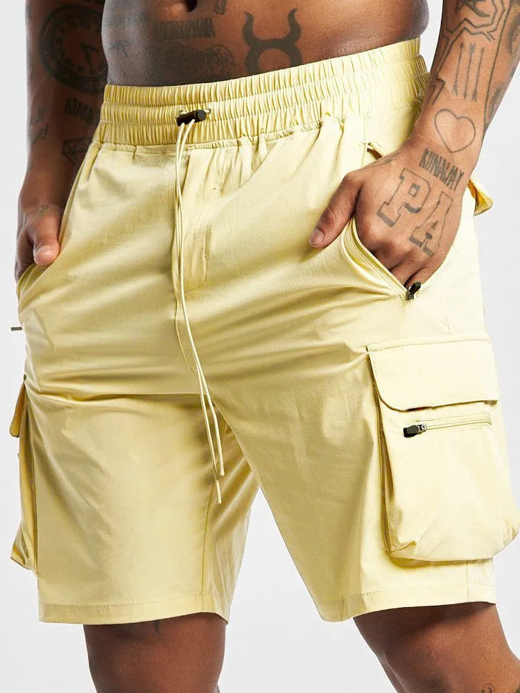 Men's black fitness shorts with four-way stretch and quick-dry fabric for running and gym workouts