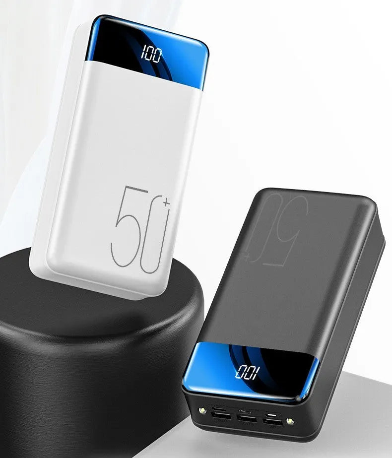 Black large capacity 50000mah portable power bank showing three output USB ports and three input charging ports on side