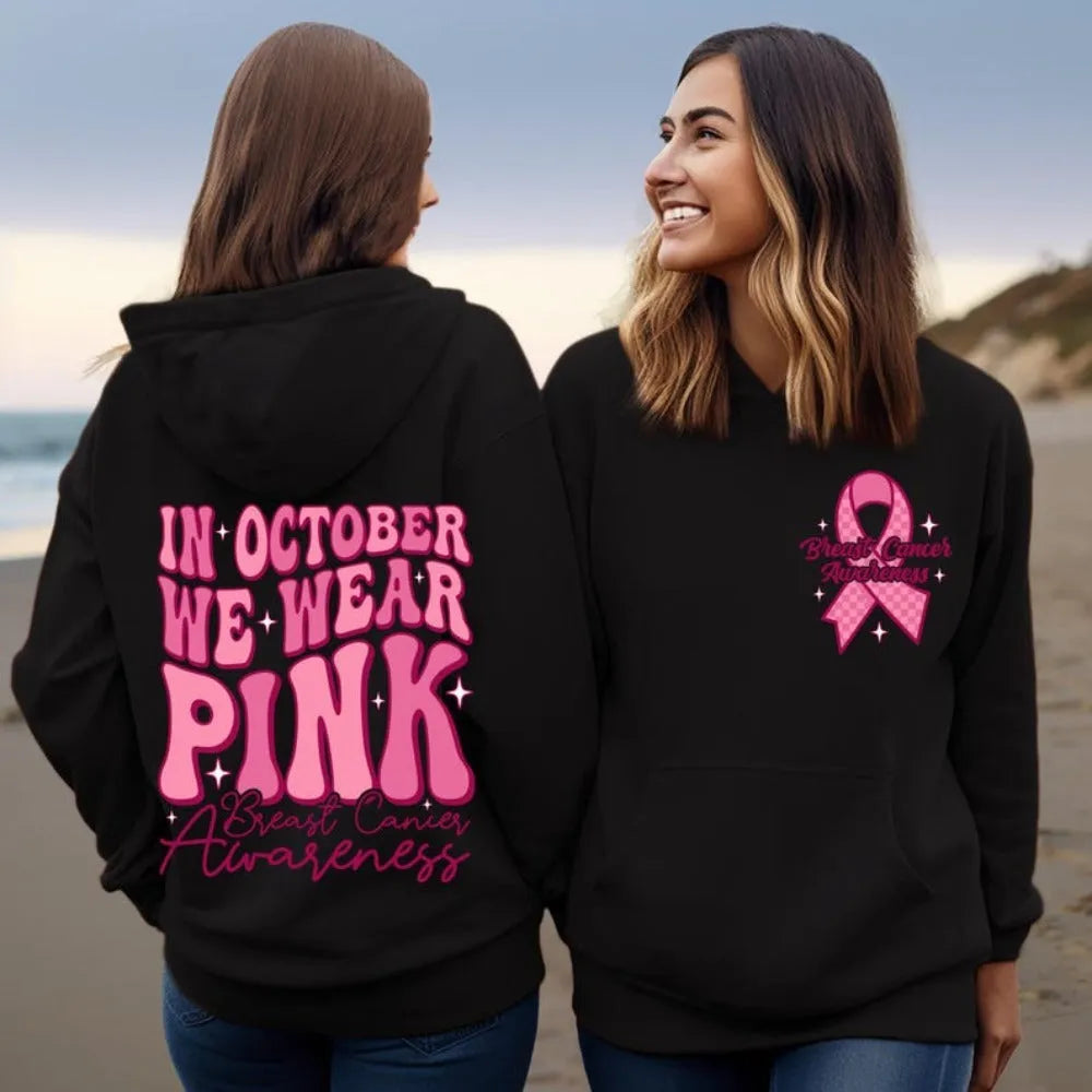 Women's pink breast cancer awareness pullover hoodie with side pockets and retro art design