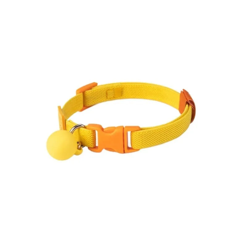 A small, elastic monochrome dog collar in sky blue with a plastic buckle, laid flat.