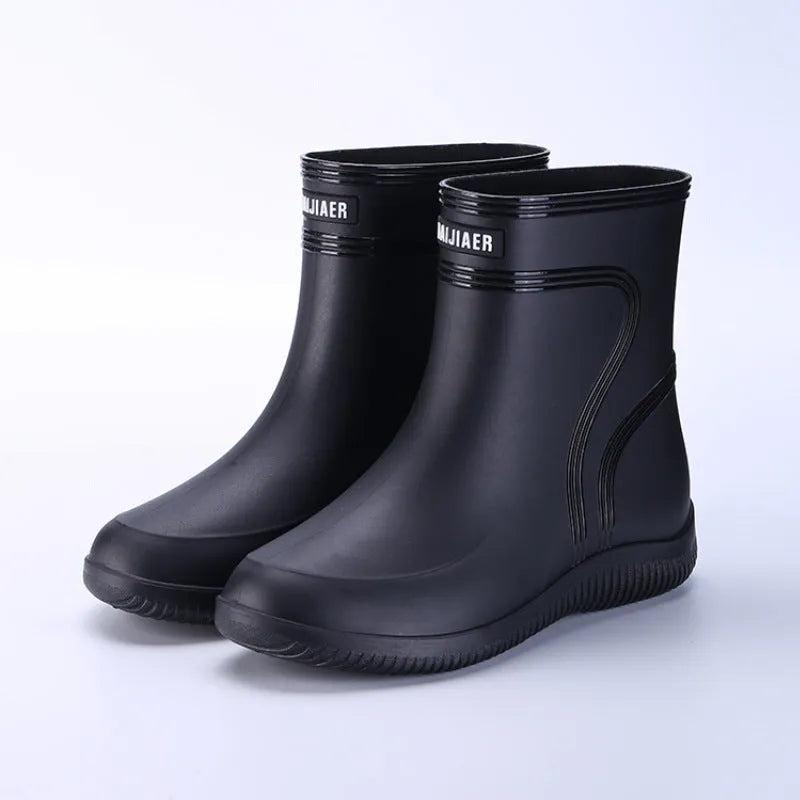 Men's waterproof mid-top rain boots with PVC upper and non-slip plastic sole in British style with tassel detail