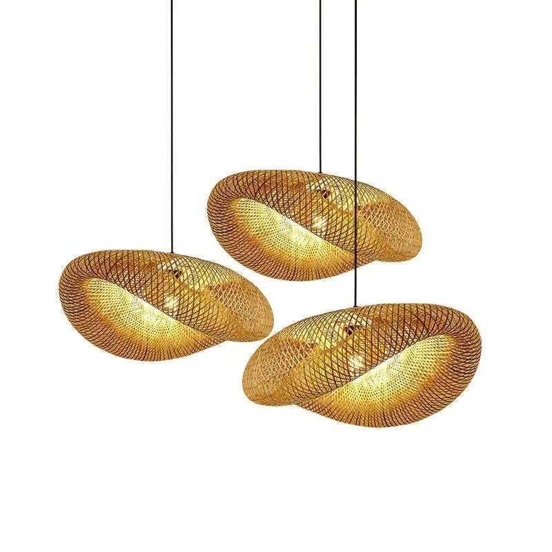 Bamboo hanging lamp with straw hat-shaped rattan weave in natural tones showing light diffusion