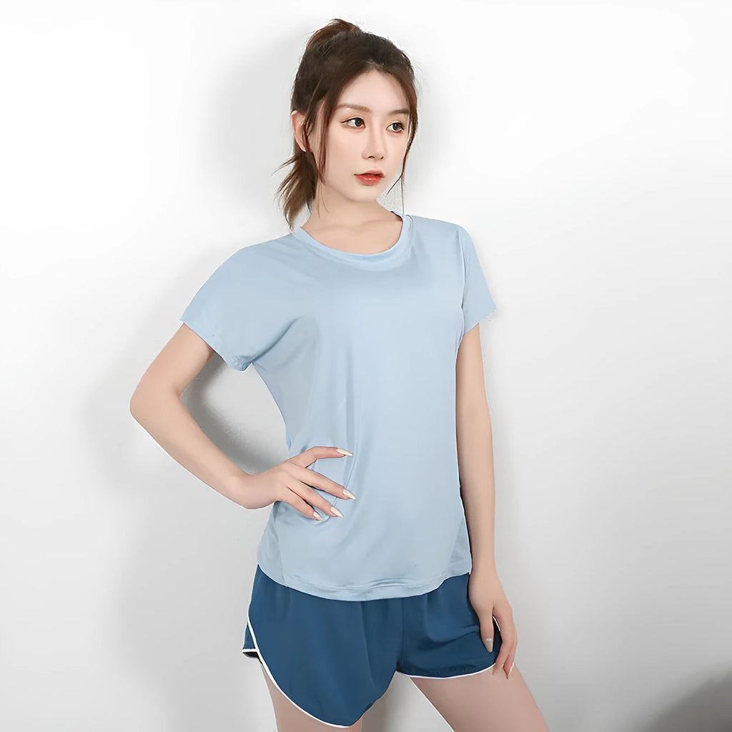Women's short sleeve polyester sports T-shirt in pink colour for gym and running workouts
