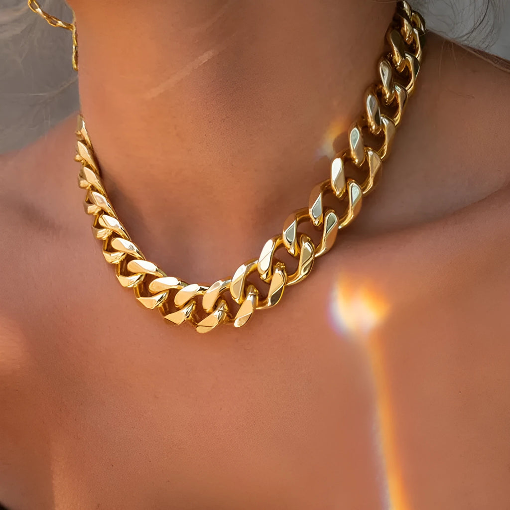 Gold women's thick link chain necklace, 32cm long with 6cm wide alloy links and dense electroplating.
