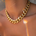Gold women's thick link chain necklace, 32cm long with 6cm wide alloy links and dense electroplating.