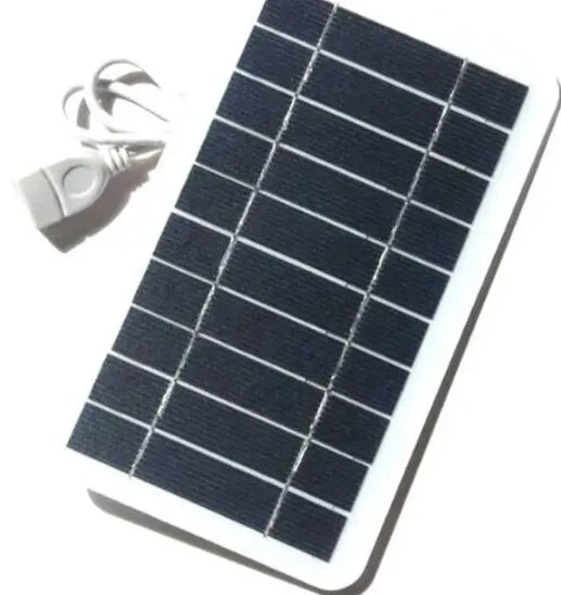 Portable solar panel charger measuring 157x94mm with USB cable for mobile device charging