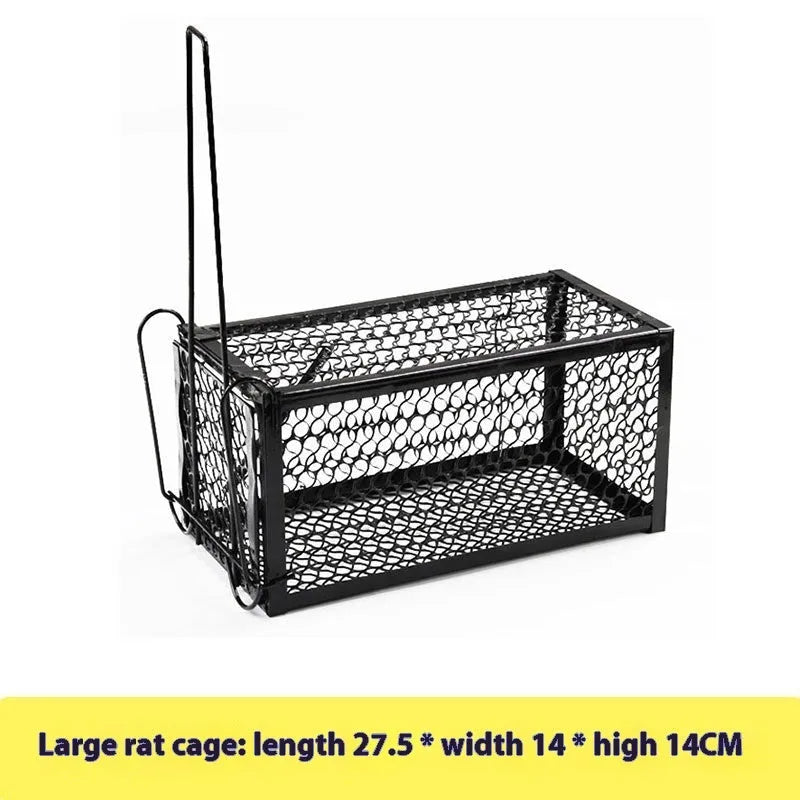 Automatic mouse cage trap with clear plastic dome and one-touch release lever at the base on a wooden floor.