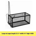 Automatic mouse cage trap with clear plastic dome and one-touch release lever at the base on a wooden floor.