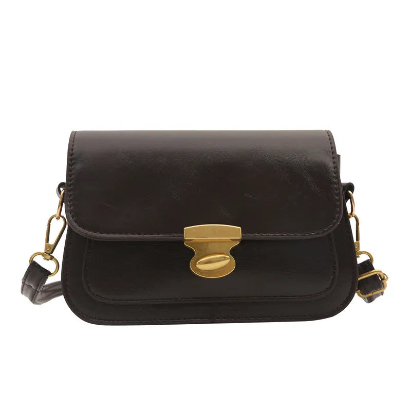 Retro square crossbody bag in PU leather with horizontal suitcase shape, 25 cm width