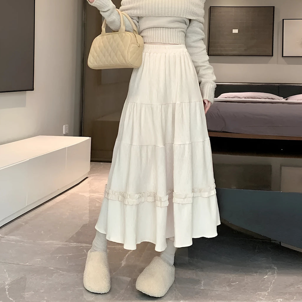 Korean style A-line corduroy skirt with elastic waistband in milky white colour.