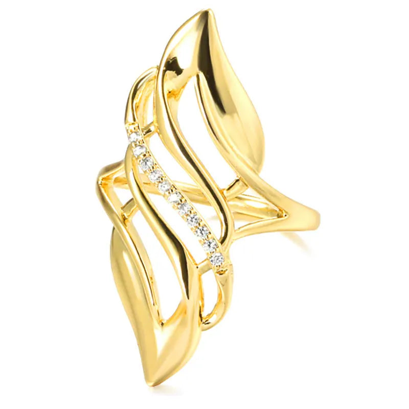 Women's exaggerated curve fashion ring in Q611 gold colour, made from copper with sparkling zircon stone accents.