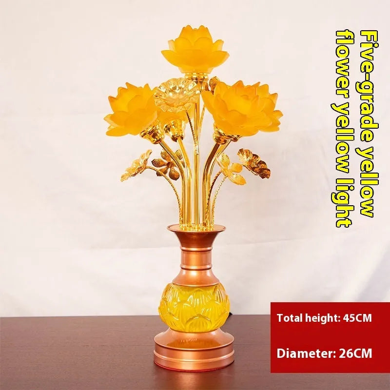 Coloured glaze pink and yellow LED lotus lantern for Buddha worship on an alloy stand.
