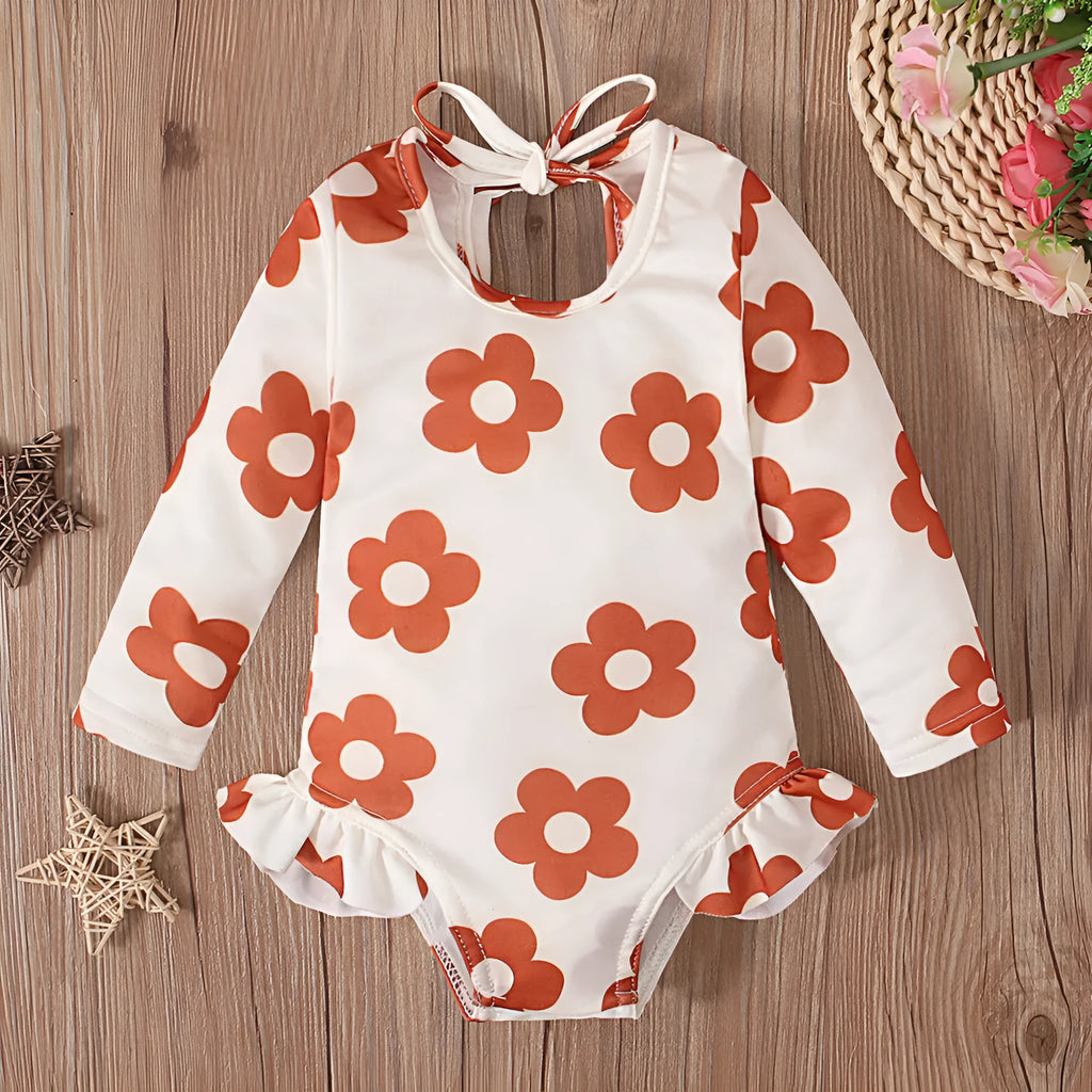 Girl's white floral print open back swimsuit with crew neck design and high-cut briefs