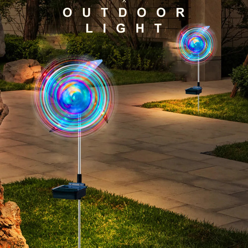 Solar wind spinner light with LED and IP65 rating, featuring spinning windmill decoration for garden paths in four colour options