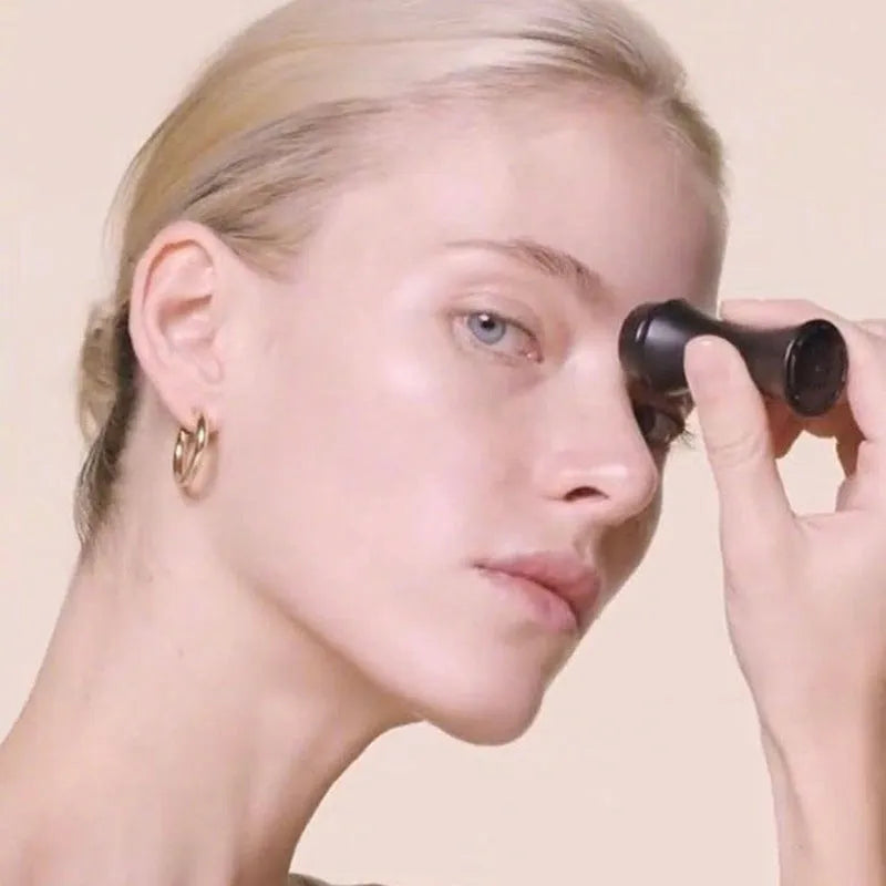 Volcanic stone facial roller for oily skin control in black, green, pink, and white colour options.