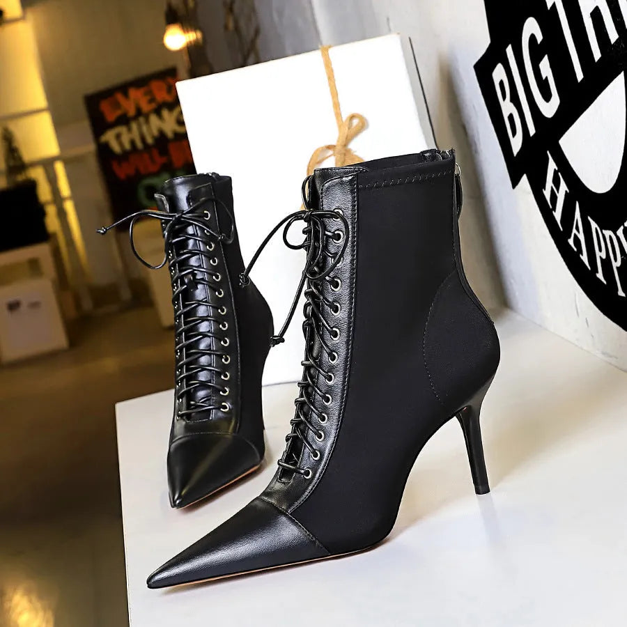 Black women's stiletto heel boots with pointed toe, back zipper, and 6-8CM heel, solid colour