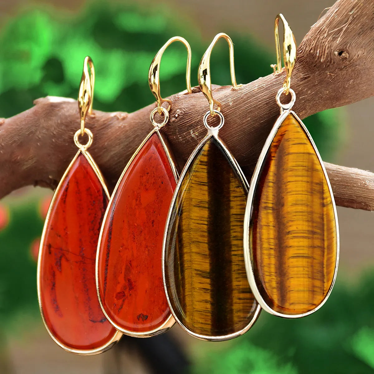 Vintage long drop earrings with tigereye stone in water drop silhouette