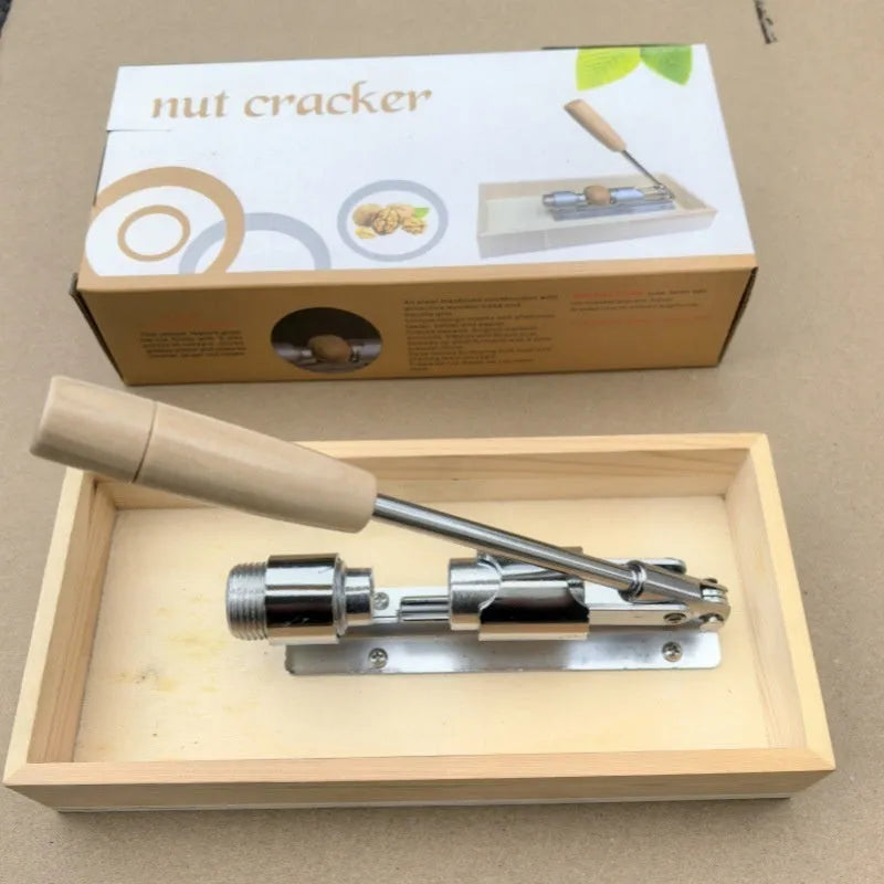 Mechanical walnut cracker with wood handle and aluminium parts, hand-crank design