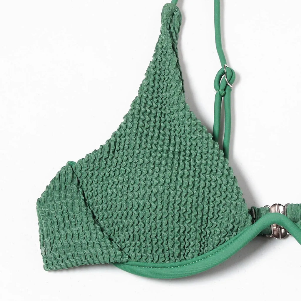 Women's green bikini swimsuit with ruffle trim top and split skirt bottom