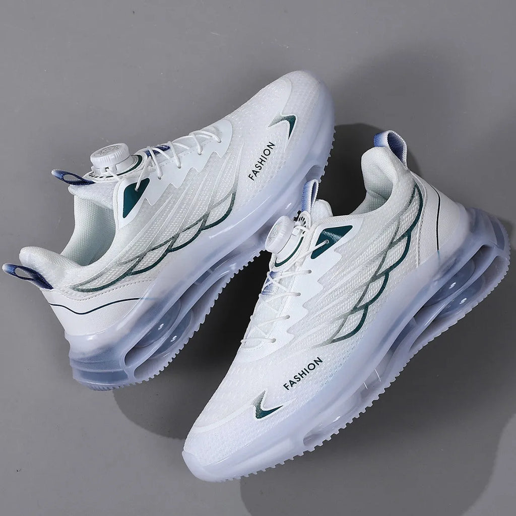 White men's casual running shoes with a rotating button closure and mesh upper on a flat rubber sole.
