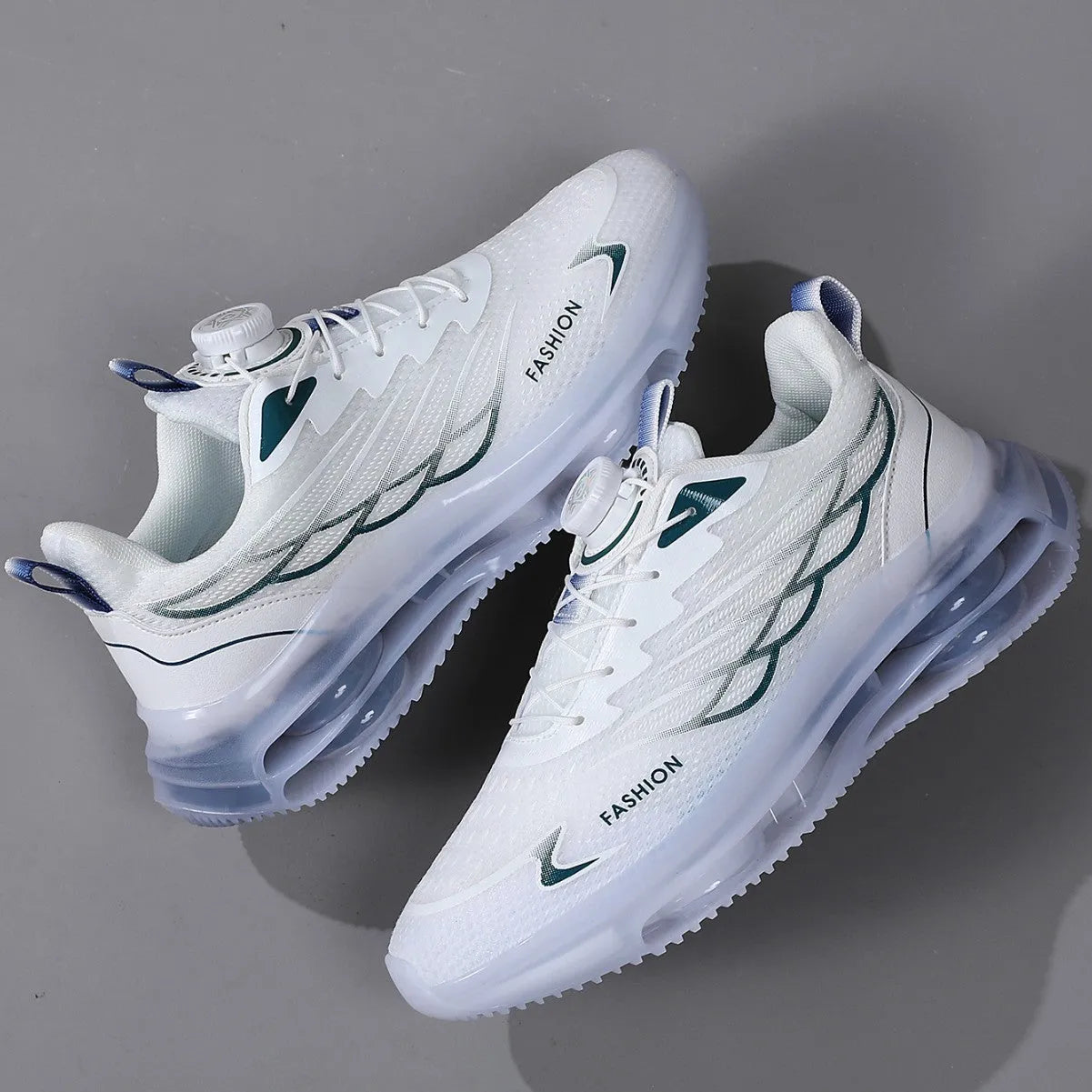 White men's casual running shoes with a rotating button closure and mesh upper on a flat rubber sole.